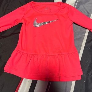 I am selling a 18 month pink Nike long sleeve